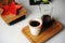 Stylish served specialty alternative black coffee. Bamboo tray, carafe. Ceramic cup without a handle. Aesthetics coffee