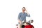 Stylish, shocked young man sitting on red scooter and looking at camera  on white