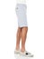 Stylish shorts for menâ€™s paired with white ankle length shoes and white background