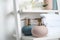 Stylish soap dispensers and towels on shelf