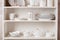 Stylish storage stand with different ceramic dishware