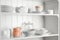 Stylish storage stand with different ceramic dishware