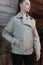 stylish style woman model leather young female portrait beige jacket beauty fashion