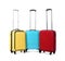 Stylish suitcases packed for travel on white background.