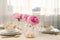 Stylish table setting with beautiful peonies and fabric napkins indoors