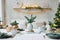 Stylish and trendy design of a festive table set for a family dinner. Vases with spruce branches, glasses and plates on the