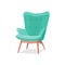 Stylish trendy model of an armchair in a trendy green color with armrests on wooden legs. Isolated vector illustration