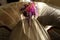 Stylish unusual wedding bouquet on beautiful chair at luxury hot