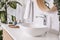 Stylish vessel sink and plants in bathroom. Interior design element