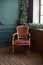Stylish vintage brown armchair. Cozy retro living room decorated Christmas or new year.