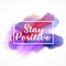 Stylish watercolor paint effect with stay positive message