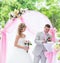 Stylish wedding ceremony elegant blonde bride and groom outdoors