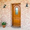 Stylish wooden front - entrance door in a detached house - embed