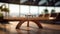 Stylish wooden table paired with abstract airport terminal blur.