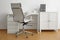 Stylish workplace interior with  office chair and desk
