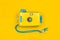 Stylish Yellow-blue camera for underwater photos on a yellow background