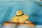 Stylish young woman in hat relaxing in pool and enjoying summer holiday. Summer vacation. Girl in sunhat on vacation in luxury