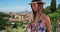 Stylish young, woman in her 20s in summer dress while traveling in Florence