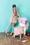 stylish youth girl in messy room with shoes