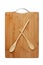 stylized clock - cutting board and wooden spoons isolated