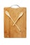 stylized clock - cutting board and wooden spoons isolated on a white