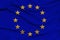 Stylized European Union flag, symbol of united Europe on soft silk with soft folds, close-up