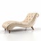 Stylized Glamour: Leather Chaise Lounge With Beige Ottoman