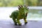 Styracosaurus dinosaur in running action on blur background
