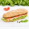 Sub sandwich whole grain grains baguette with ham square on wood