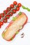 Sub sandwich whole grain grains baguette with salami portrait format from above on wooden board