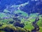 The subalpine Oberterzen settlement on the slopes of Glarus Alps and over Lake Walensee - Canton of St. Gallen, Switzerland