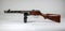 Submachine gun ppsh-41 on a light background.