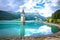 Submerged bell Tower of Curon Venosta or Graun im Vinschgau on Lake Reschen landscape view