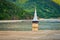 Submerged church in polluted lake at Geamana, Romania