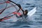 Almost submerged windsurfer