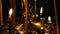 Subtle church candles burn in an Orthodox Christian