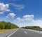 Suburban empty high-speed motorway on a sunny day