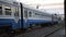 Suburban passenger diesel train carries passengers