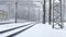 Suburban passenger train departing in snowy winter day