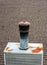 Suburban rooftop, mossy asphalt shingles, rusty chimney and chimney cap