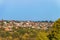 Suburban skyline. Buildings individual suburban housing in the green plants district.