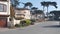 Suburban street, residential district, houses or homes, California architecture.