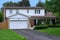 Suburban two story house with double garage