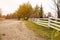 Suburban wooden fence along the country road