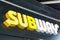 Subway sign and text logo front of restaurant fast food shop and delivery franchise