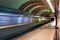 Subway station. Diagonal blue motion blur metro train background. Train departure. Fast underground subway train while
