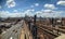 Subway tracks along Queens Boulevard with NYC cityscape