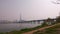 Subway train on bridge across Han river, panorama of Lotte World Tower in distant, Seoul