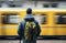 subway travel man standing in subway train station with backpack travelling with rail transportation concept of eco friendly green