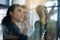 Succeeding is top priority. Shot of a group of colleagues brainstorming together on a glass wall in an office.